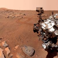 View from Mars: red landscape and robot